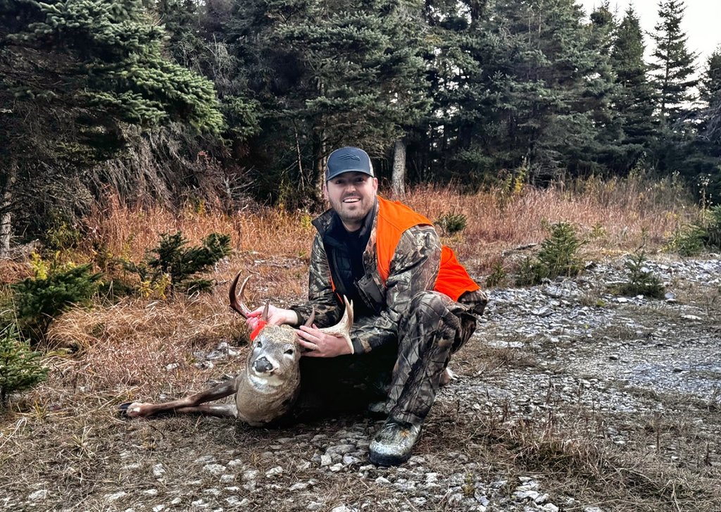 Pat Jr. with his trophy buck taken in Anticosti, Canada