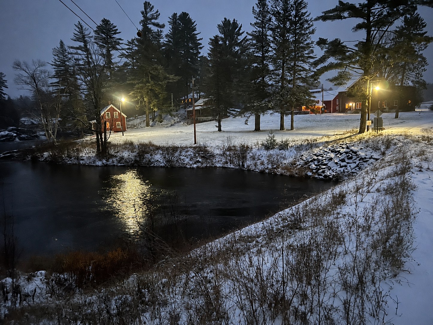 Two Falls Camps in the snow at dusk